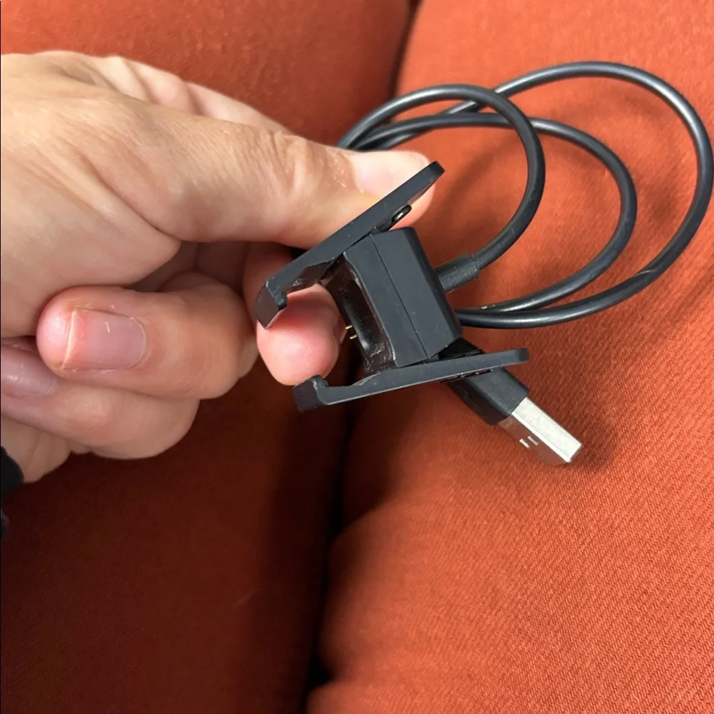 Black Fitbit Charge 2 with Charger